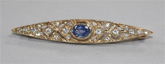 A modern 9ct gold, sapphire and diamond marquise shaped brooch, 51mm.